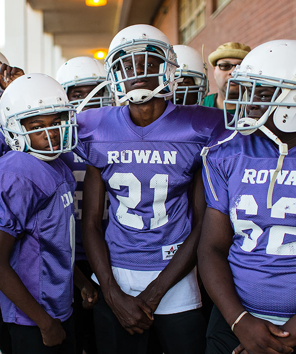 Several young football players